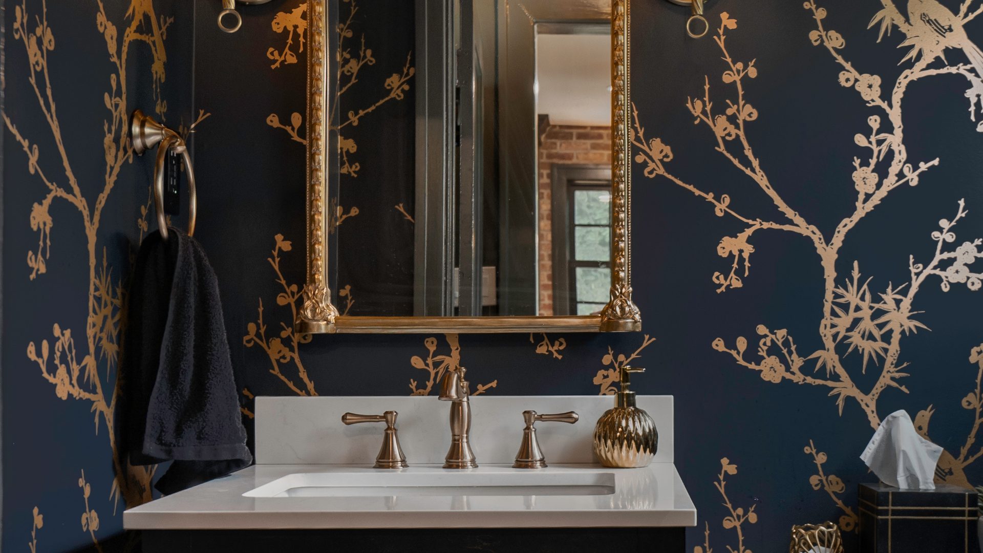 Bold patterned accent wall in a professionally designed interior